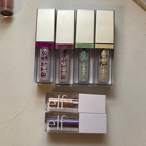assortment of stila and elf liquid eyeshadows